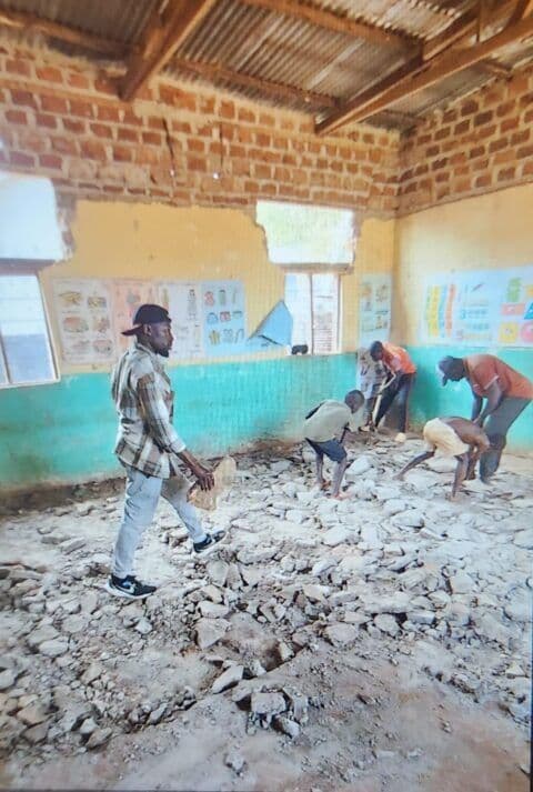 Workers building orphanage